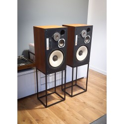 High stands for JBL L100.